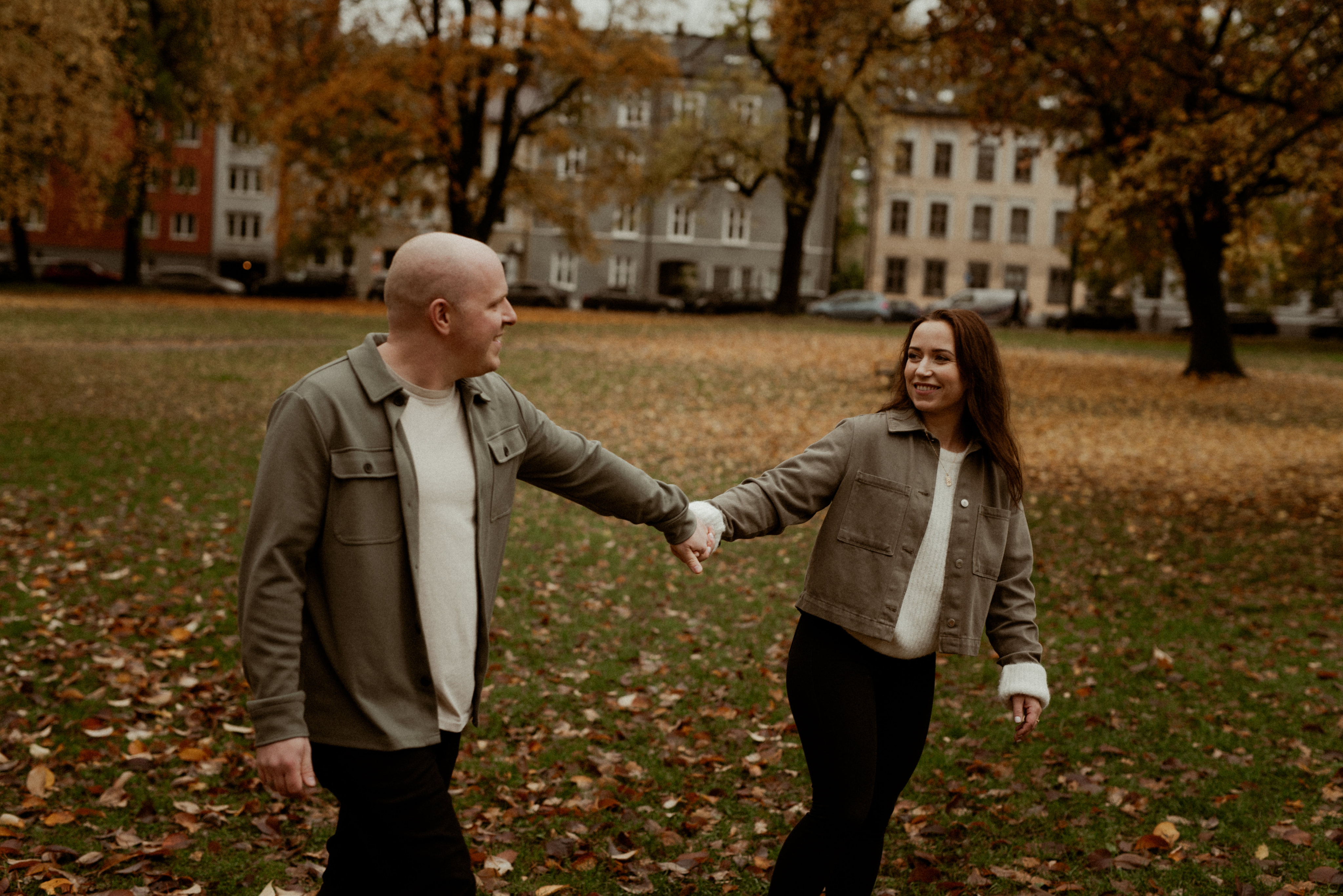 Delicate flowers taped to a wall.
